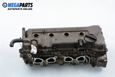 Engine head for Nissan Primera (P10) 1.6, 102 hp, station wagon, 1993