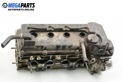 Engine head for Nissan Almera (N16) 1.5, 90 hp, hatchback, 5 doors, 2001