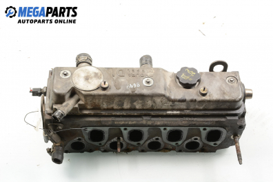 Engine head for Ford Focus I 1.8 TDDi, 90 hp, station wagon, 2001