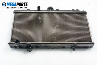 Water radiator for Nissan Almera (N16) 1.5 dCi, 82 hp, hatchback, 5 doors, 2003