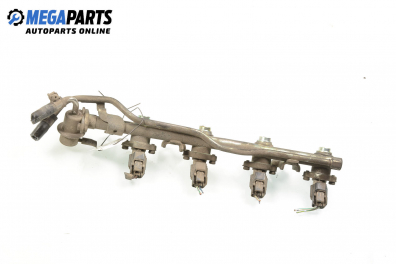 Fuel rail with injectors for Nissan Micra (K11C) 1.3 16V, 75 hp, 3 doors automatic, 1999