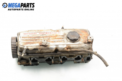 Engine head for Mitsubishi Colt IV 1.3 12V GLI, 75 hp, hatchback, 3 doors, 1992