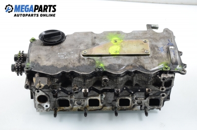 Engine head for Nissan Almera (N16) 2.2 DI, 110 hp, 3 doors, 2001