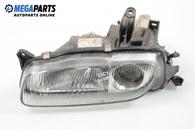 Headlight for Mazda 323 (BA) 1.5 16V, 88 hp, hatchback, 5 doors, 1994, position: left