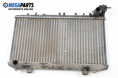 Water radiator for Nissan Primera (P10) 1.6, 102 hp, sedan, 1995