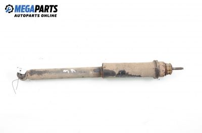 Shock absorber for Nissan Micra (K11) 1.0 16V, 54 hp, 3 doors, 1997, position: rear - left