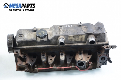 Engine head for Ford Focus I 1.8 TDDi, 90 hp, hatchback, 5 doors, 1999