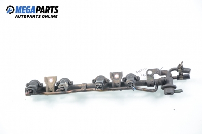 Fuel rail with injectors for Nissan Primera (P11) 1.6 16V, 99 hp, hatchback, 1997