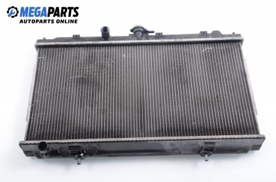 Water radiator for Nissan Almera 1.5, 98 hp, hatchback, 5 doors, 2003