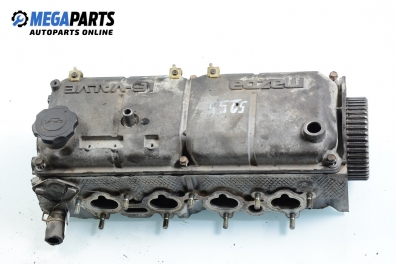 Engine head for Mazda 323 (BA) 1.3 16V, 73 hp, hatchback, 3 doors, 1997