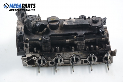 Engine head for Ford Fiesta V 1.4 TDCi, 68 hp, hatchback, 5 doors, 2005