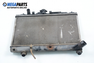 Water radiator for Mazda 121 (DB) 1.3 16V, 53 hp, sedan, 1992