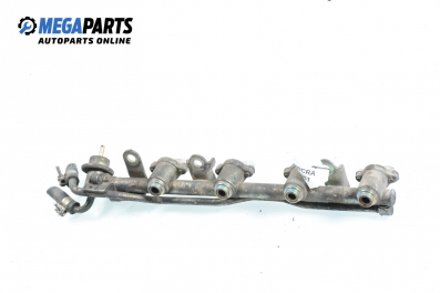 Fuel rail with injectors for Nissan Micra (K11) 1.0 16V, 54 hp, 3 doors, 1996