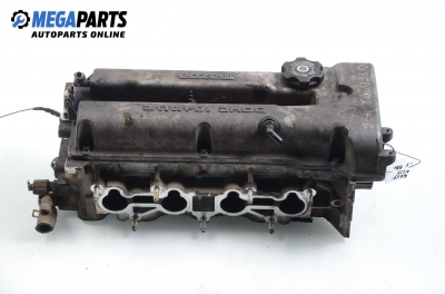 Engine head for Mazda 323 (BA) 1.5 16V, 88 hp, hatchback, 5 doors, 1995