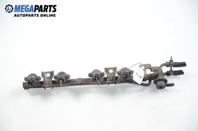 Fuel rail with injectors for Nissan Primera (P10) 1.6, 90 hp, sedan, 1996