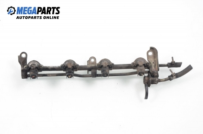 Fuel rail with injectors for Nissan Primera 2.0 16V, 131 hp, sedan, 1996