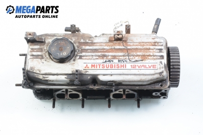 Engine head for Mitsubishi Colt IV 1.3 12V, 75 hp, hatchback, 3 doors, 1993