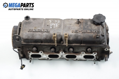 Engine head for Mazda 323 (BA) 1.3, 73 hp, hatchback, 3 doors, 1997