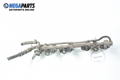 Fuel rail with injectors for Nissan Micra (K11) 1.0 16V, 54 hp, 3 doors, 1994