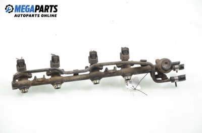Fuel rail with injectors for Nissan Primera (P10) 1.6, 102 hp, station wagon, 1995