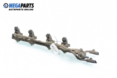 Fuel rail with injectors for Nissan Primera (P10) 1.6, 102 hp, sedan, 1993