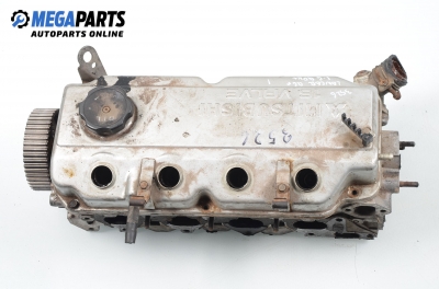 Engine head for Mitsubishi Lancer 1.6, 90 hp, hatchback, 5 doors, 1991