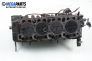 Engine head for Ford Focus I 1.8 TDDi, 90 hp, station wagon, 5 doors, 2000