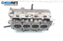 Engine head for Mazda 121 1.25, 75 hp, hatchback, 1997