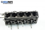 Cylinder head no camshaft included for Peugeot 206 2.0 HDi, 90 hp, station wagon, 2003