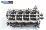 Engine head for Nissan Almera (N16) 2.2 Di, 110 hp, hatchback, 5 doors, 2002